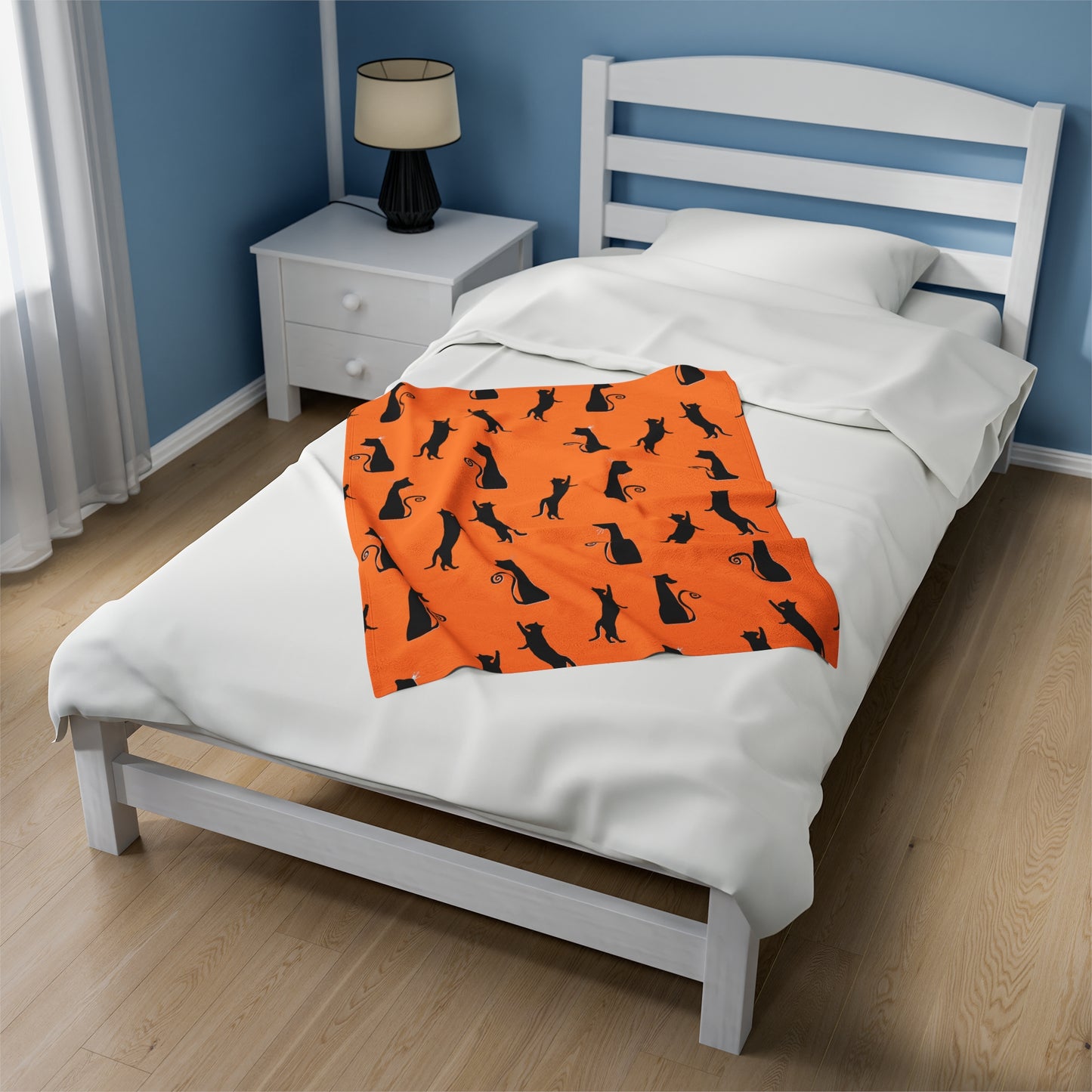 Black Cats on Orange Blanket