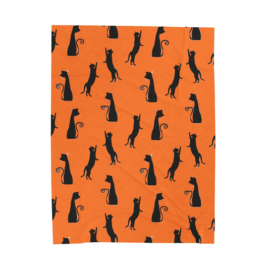 Black Cats on Orange Blanket