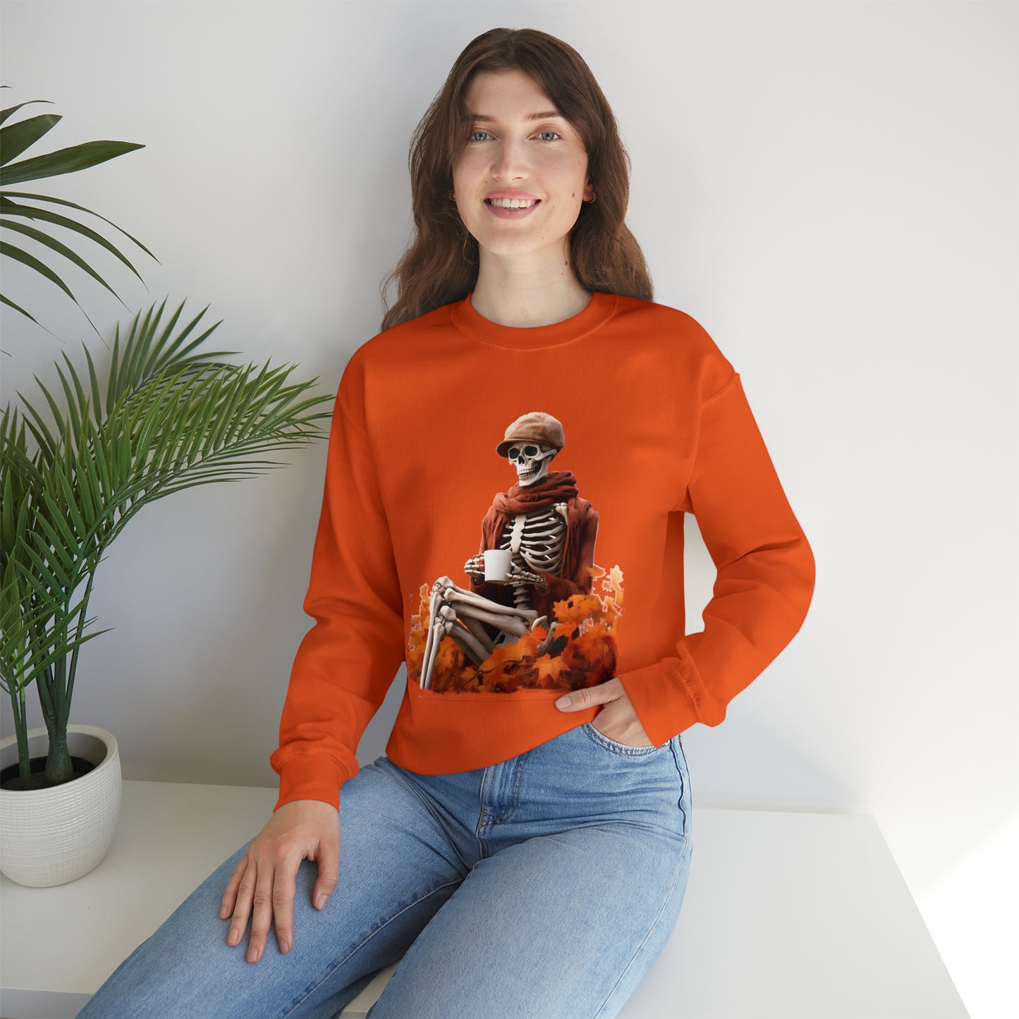 Skeleton in Fedora Sitting With Fall Leaves Halloween Sweatshirt